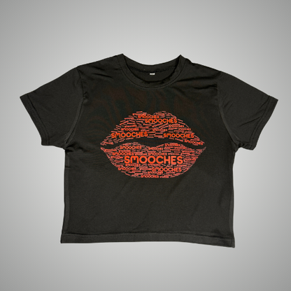 Black t-shirt with red 'Smooches' graphic crop to[